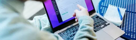 Man pointing to a laptop